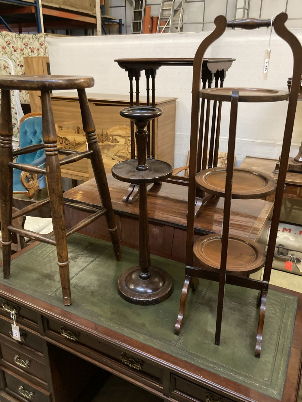 An Edwardian folding cake stand, a beech bar stool and a smokers stand